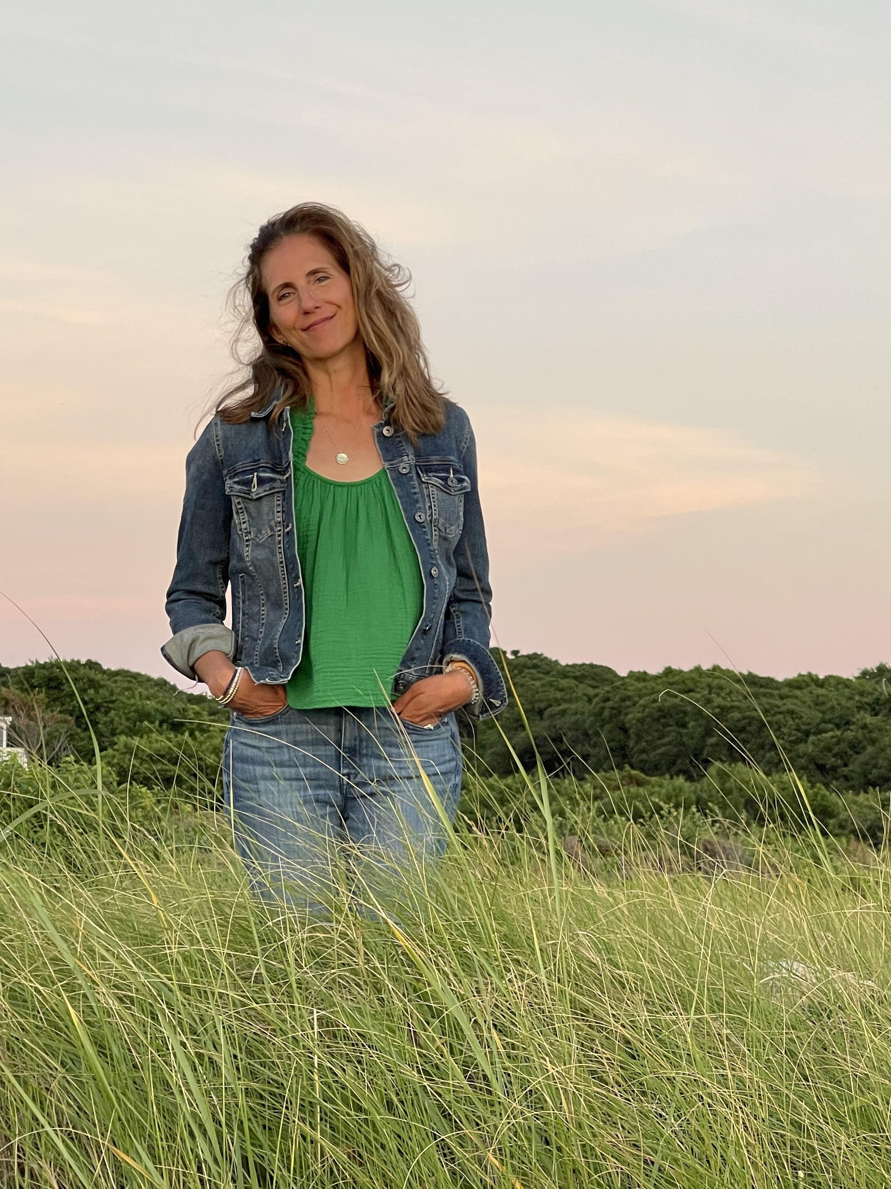 Rebecca Morse standing in tall grass